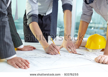 stock-photo-three-pairs-of-hands-sketching-a-housing-project-93376255